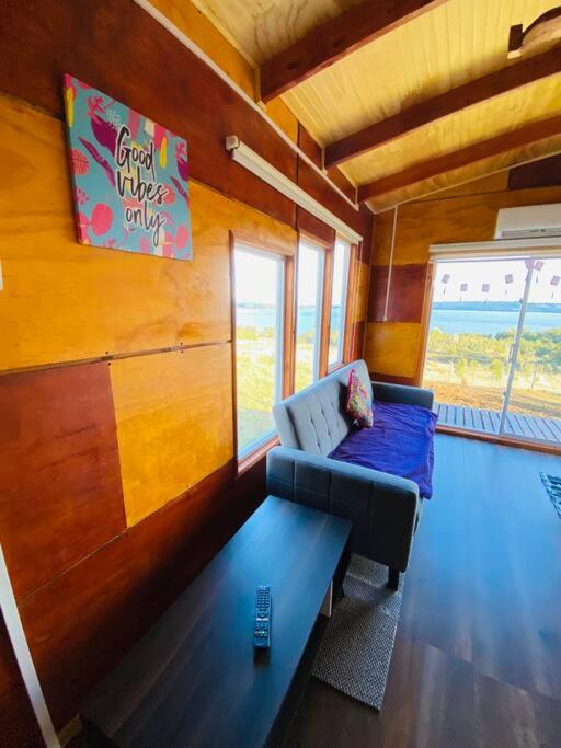 Quellon House | Agradable cabaña, con vista al mar y cordillera