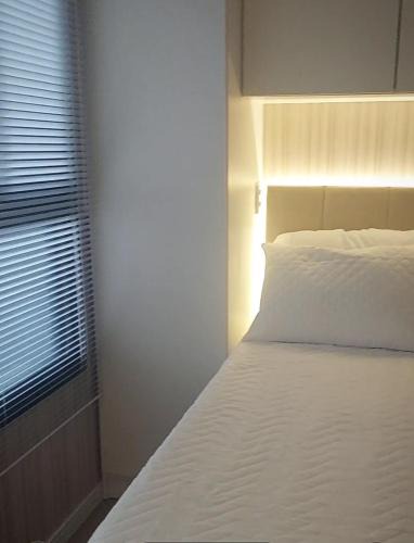 Reboucas Apartment | Apto Studio Inteiro - Central - 2 pessoas - Coworking - academia - Colchão com massageador - Próx do Shopping Estação!