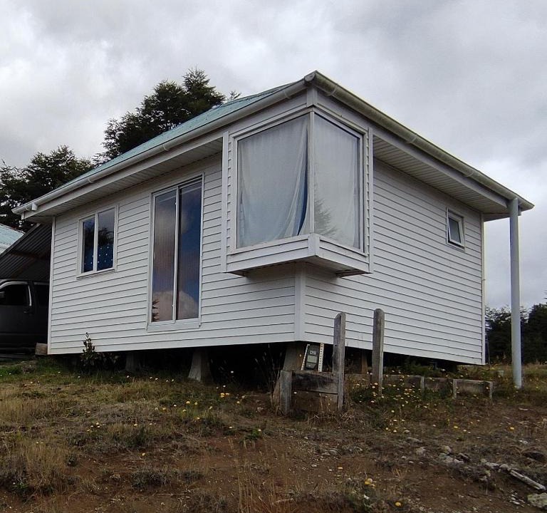 Rilan House | Cabaña Carpintero negro
