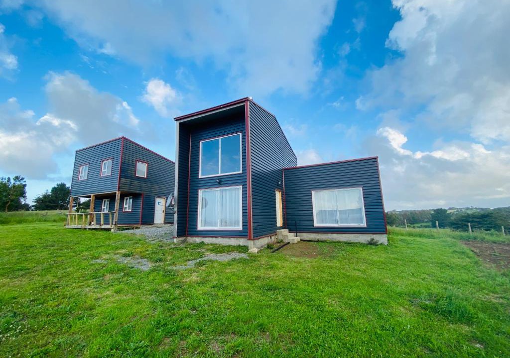Ancud House | Cabañas Pacífico - Faro Corona