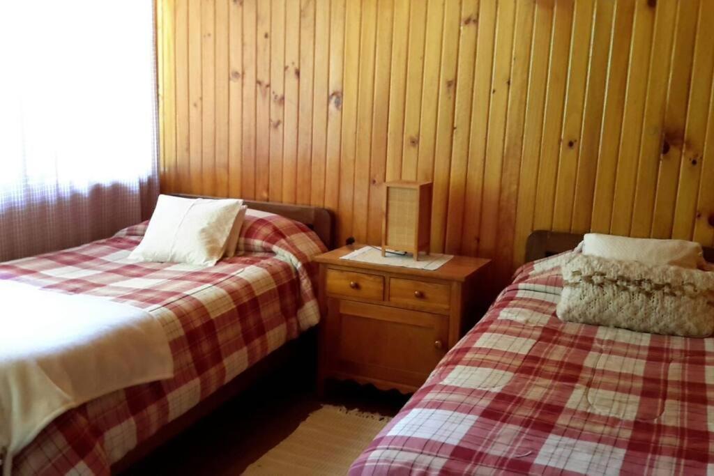 Villarrica House | Casa con vista al lago y playa privada