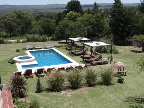 La Falda Apartment | El Algarrobo Escondido Cabañas, Padel y Bosque Serrano