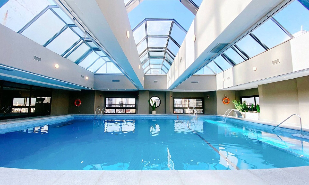 Microcentro Hotel | Escape to a Tranquil Room Near Puerto Madero Riverfront Dining | Rooftop Pool