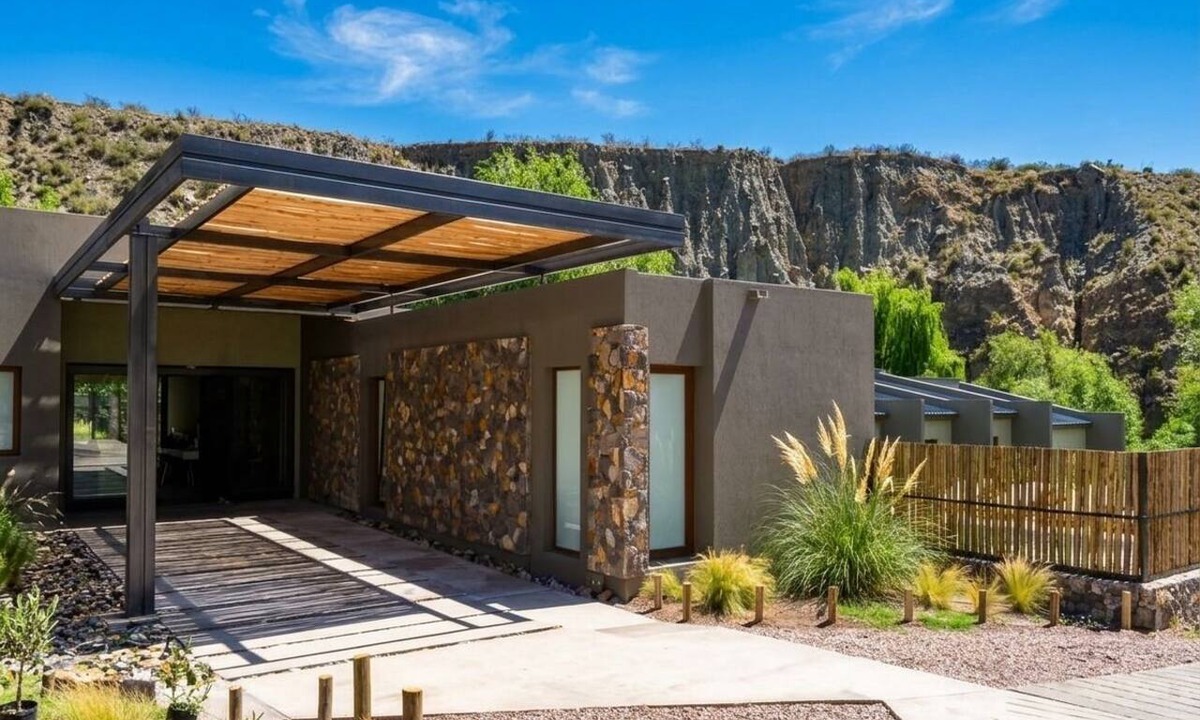 Vistalba Apartment | Family Room with River, Mountain, Spa, and Pool Views
