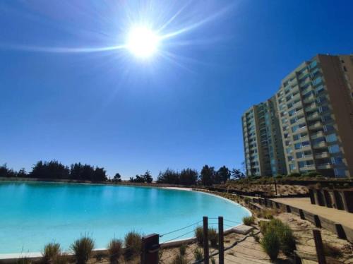 El Tabo Apartment | Maravilloso Depto 2D2B en Condominio LagunaMar con Vista Hermosa a la Laguna Estacionamiento y Piscina