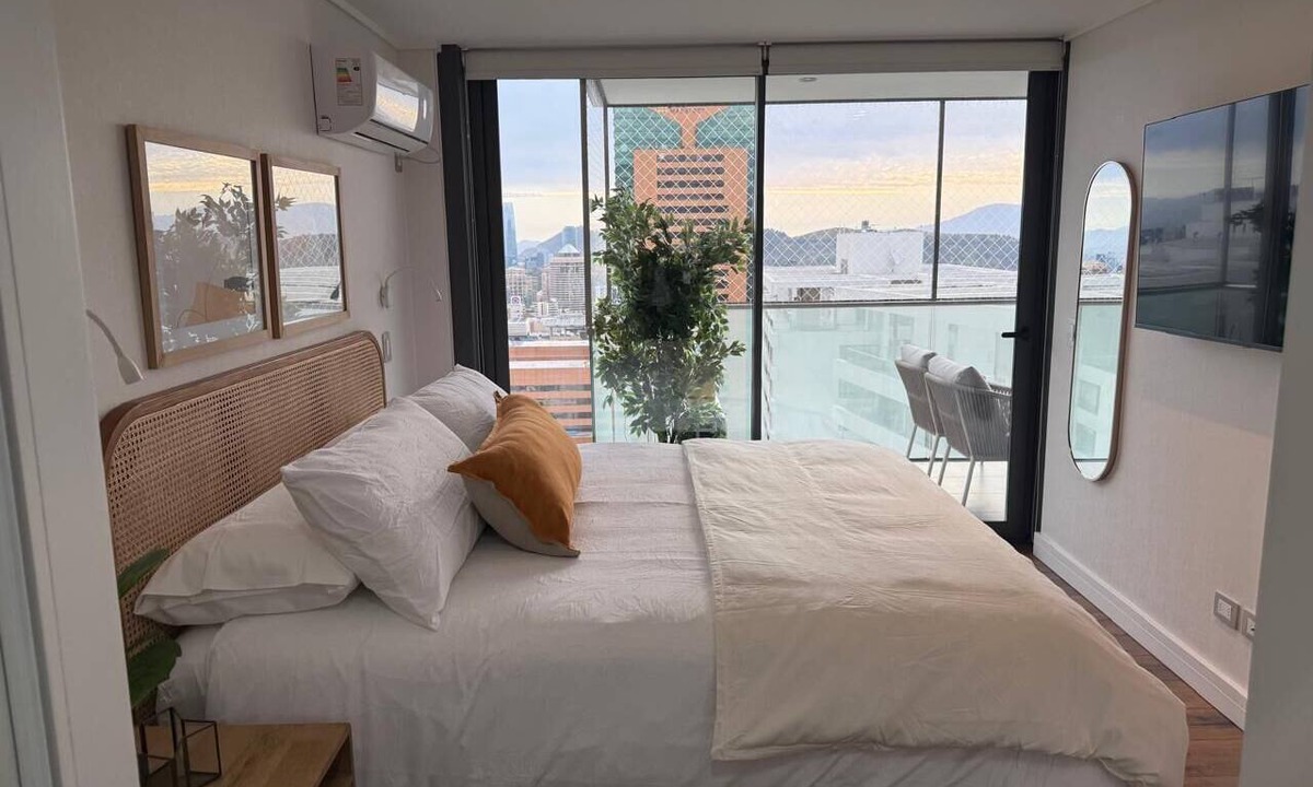 Apoquindo Apartment | Modern apt with king bed, sofa bed, washer/dryer, terrace. Near Parque Arauco.