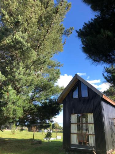 Frutillar Apartment | Tiny House, Tiny Black Frutillar