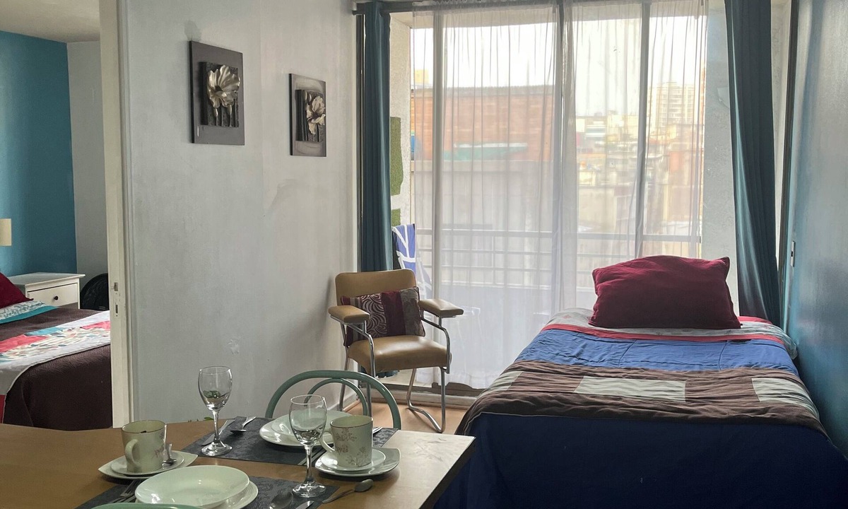 Downtown Santiago Apartment | Warm 1 bedroom apt. 1 bedroom apartment half a block from Sta. lucia subway station.
