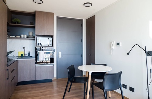 El Golf Apartment | 2BR Oasis in Las Condes Ready for Relaxation