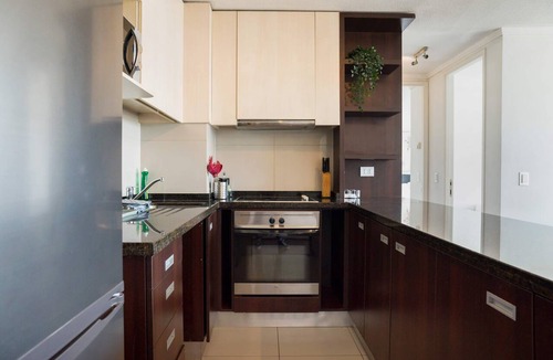 Apoquindo Apartment | 2BR Retreat in Las Condes: Steps to Mall & Park