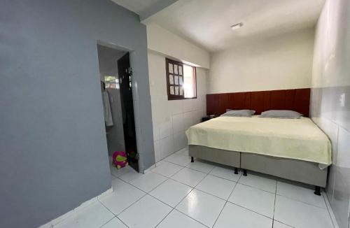 Liberdade House | Alugo quarto grande com suite
