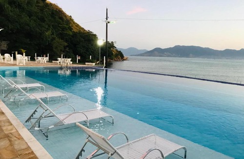 Prainha Apartment | Apartamento pé na areia frente para o Mar e piscina na Prainha