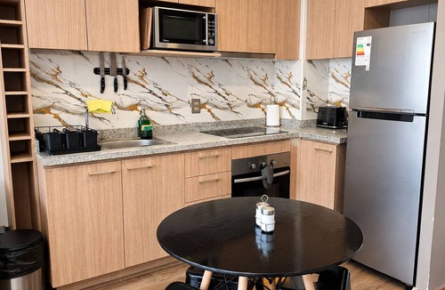 Las Rejas Apartment | Apartment with direct access to Line 1, the bus terminal, and the train station