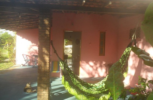 Armacao do Tairu Condo | Beach house in Ilha do Sol, 80m from the beach, with a wooded backyard.