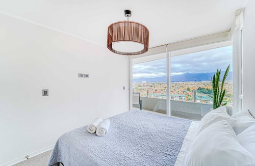 La Herradura Apartment | Bohemian Minimalist with Piano and Office