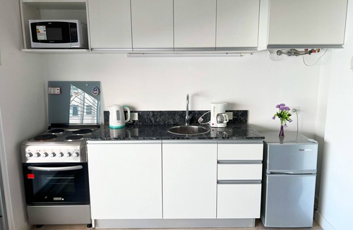 Almagro Apartment | Brand new studio in Almagro with rooftop terrace, bathtub and balcony | Hospital Italiano, audiovisual hub & Av. Corrientes