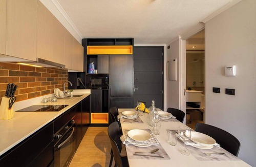 Santiago Apartment | Bright Studio: Pool, Gym, Balcony & City Views!