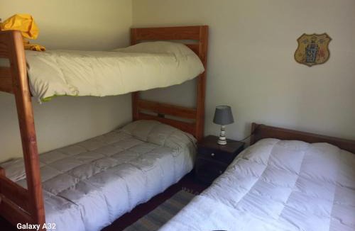 Villarrica House | Cabaña en parcela con Tinaja - Puertas del Bosque