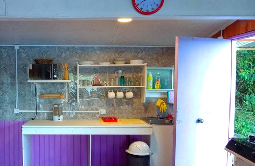 Bahia Mansa Cabin | Cabaña Maicolpue Rio Sur has a large terrace with beautiful ocean view.