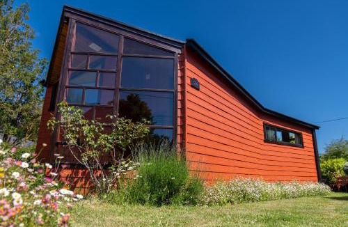 Frutillar House | Cabañas Entre Verdes