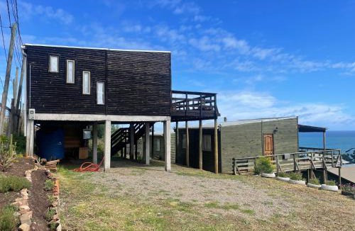 Curanipe House | Cabañas Refugio Costero