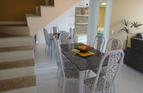 Centro Apartment | Cabo Frio, foot in the sand, beautiful coverage with air conditioning, barbecue, sink.