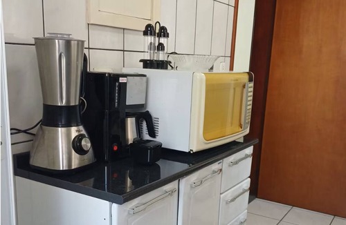 Jardim Virginia Apartment | Comfort and Leisure in Guarujá. Wi-fi, swimming pool and garage