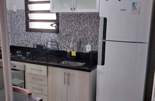 Toninhas Apartment | cond. Wembley Tennis Ubatuba apartment with pool view, 150 meters from the beach. Porpoises