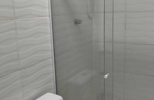 Guaratiba Apartment | Container Black