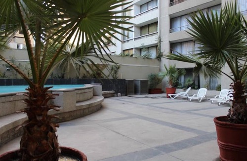 Downtown Santiago Apartment | Cozy 1 Bedroom Apartment Half a block from Sta. Lucia subway station -