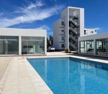 Puerto Madryn Apartment | Departamento Nuevo- Piscina Techada- Climatizada - Confort y Calidad a metros del mar