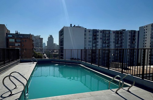 Downtown Santiago Apartment | Downtown Santiago Oasis: Rooftop Pool, Cowork Space & Sunset Balcony