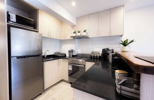 San Martin de los Andes Condo | Enjoy with your family the best view of the waterfall I Ayres del Bosque Accommodations