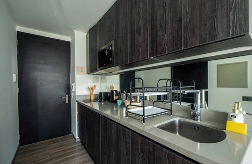 Downtown Santiago Apartment | Executive Office · Gym · Coworking Space · Cumming Metro Station