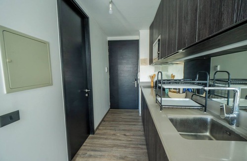 Downtown Santiago Apartment | Executive Office · Gym · Coworking Space · Cumming Metro Station