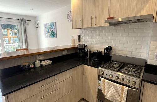 San Martin de los Andes Condo | Family Getaway with Waterfall View I Ayres del Bosque Accommodations