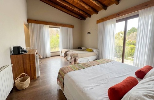 Vistalba Apartment | Family Room with River, Mountain, Spa, and Pool Views