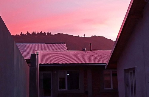 Esquel Apartment | Flamencos Apart Apartment warm and modern.