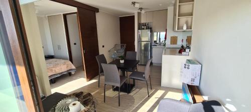 Macul Apartment | Frente del metro