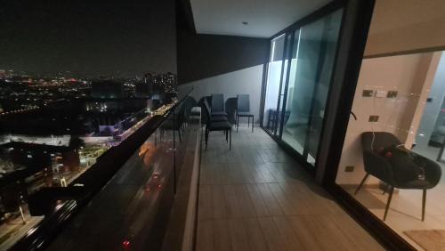 Macul Apartment | Frente del metro