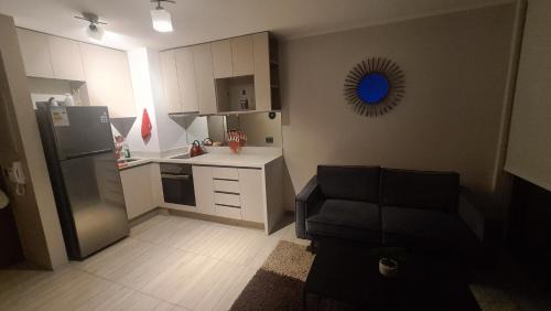 Macul Apartment | Frente del metro