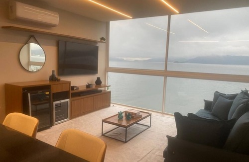 Ponta Leste Apartment | Home Sweet Sea. Beachfront Retreat: Luxury, Comfort and Exclusive SPA