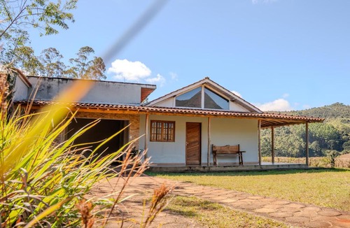 Aiuruoca House | Hospedagem Colinas