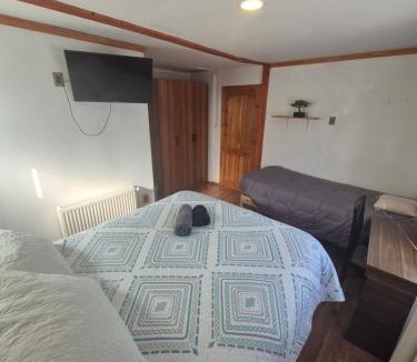 Punta Arenas House | hostal perez de arce - habitacion triple