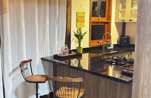 Bexiga House | House on Curral beach in Ilhabela, with pool and barbecue. Two suites.