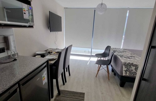 Independencia Apartment | In front of Hospital U. de Chile with parking lot.