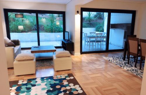 El Golf Apartment | Jardín privado para familias y trabajo