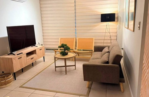 Linares Apartment | Just a short walk from the shopping center—ideal for families, couples, or business trips.