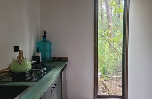 Curarrehue Cabin | Komorebi Lodge | River, forest, clay tub, breakfast, transportation. All-inclusive