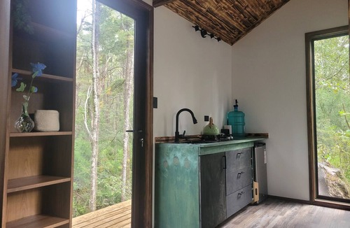 Curarrehue Cabin | Komorebi Lodge | River, forest, clay tub, breakfast, transportation. All-inclusive